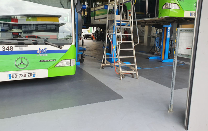 Losetas Modulfix en taller de reparación de autobuses
