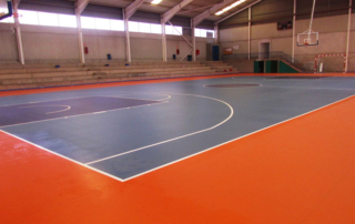 Campo de baloncesto con pavimento deportivo pvc Sportex